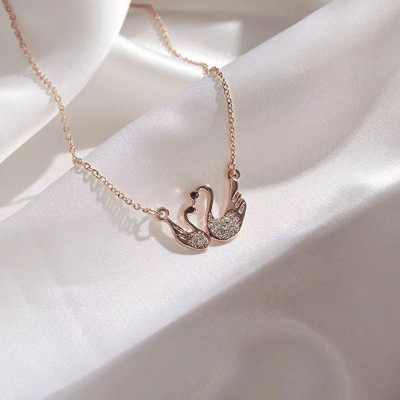 Dây chuyền đôi CDE Swan vàng hồng CDE6399RG